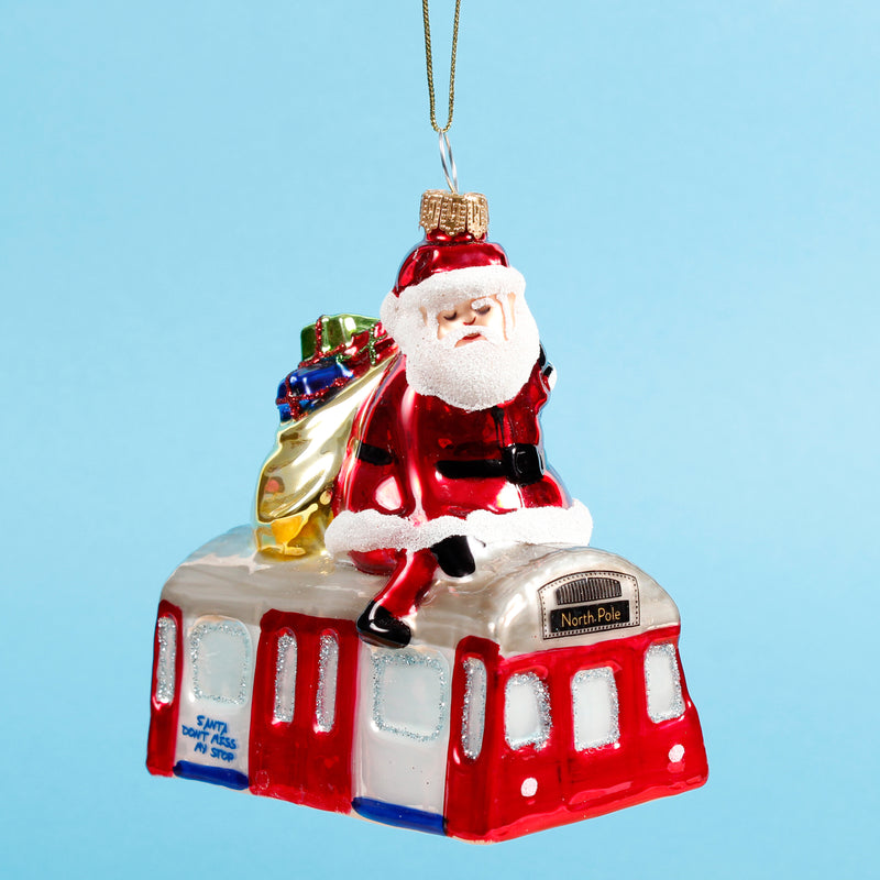 Santa Riding the Tube Shaped Bauble