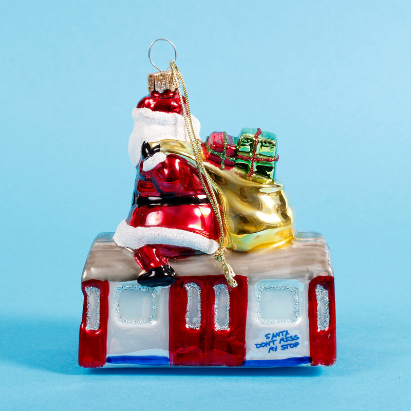 Santa Riding the Tube Shaped Bauble