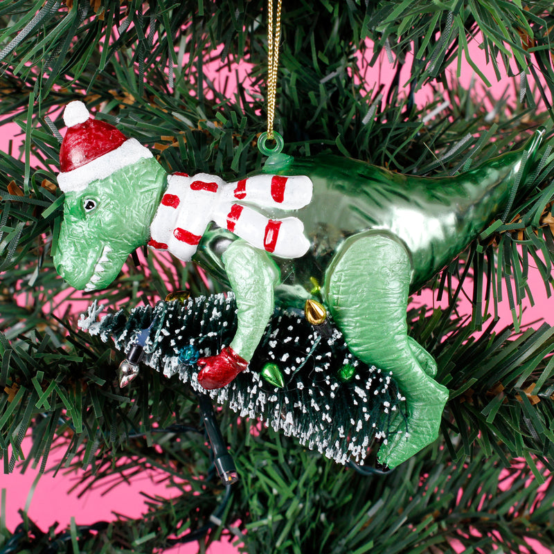 Dinosaur With A Christmas Tree Shaped Bauble Hanging Decoration